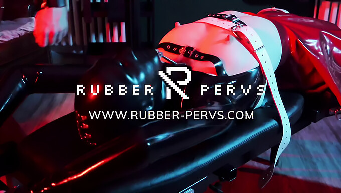 Rubber-clad solo play in gynecological-themed fetish video - Part Two